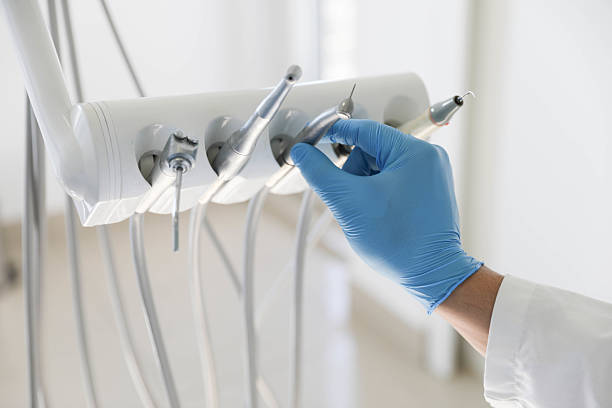 Professional Tooth Extraction technician working in Edwardsville, IL